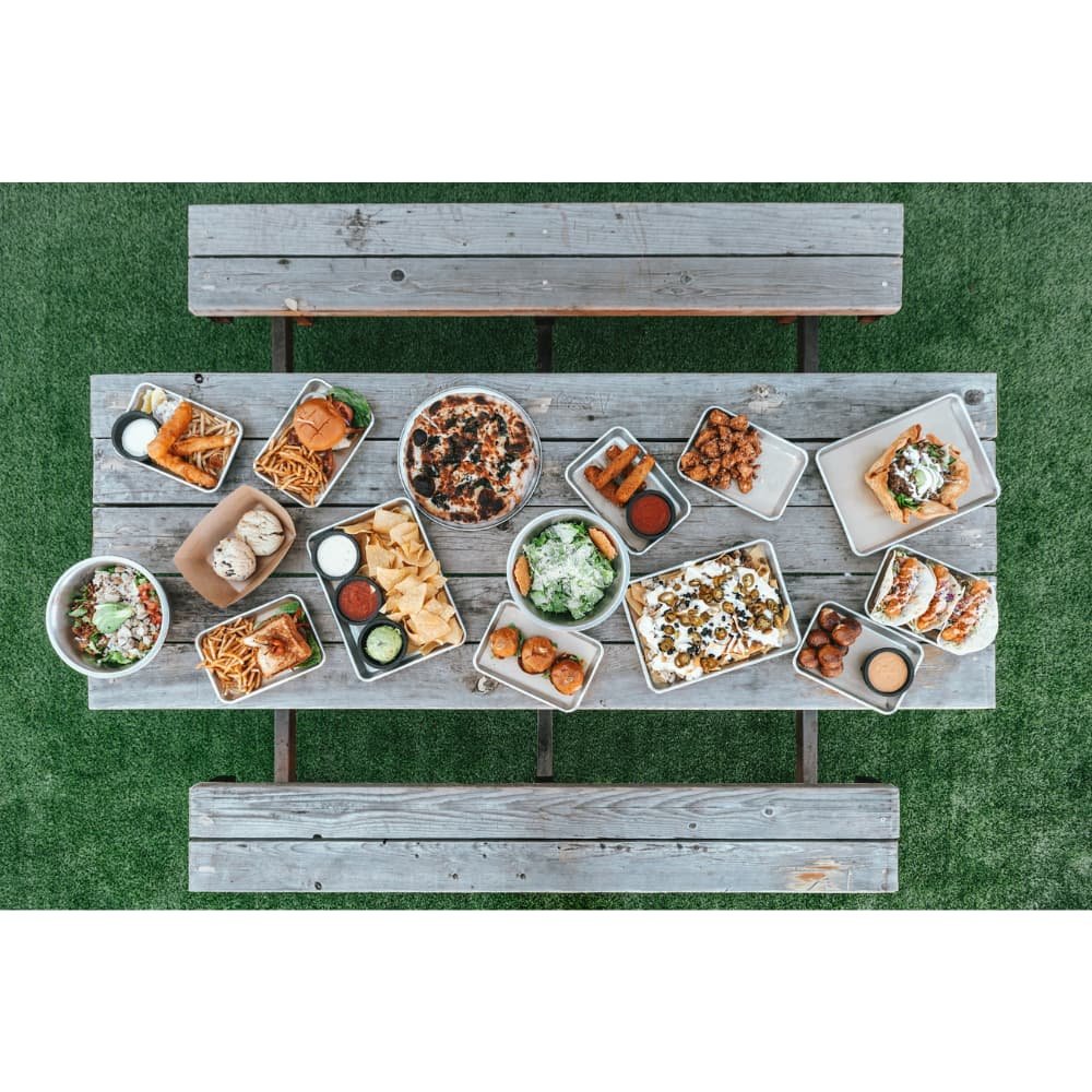 Backyard pot luck table