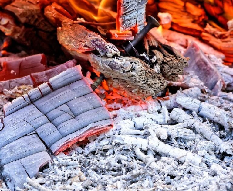 8 Surprising Uses For Fire Pit Ashes: From Soil Amendment To Bug Repellent!